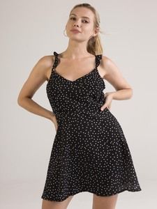 Dress with polka dots and back open